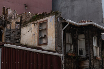 Wall Mural - decrepit old building in the midst of urban Istanbul