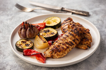 Wall Mural - Grilled chicken breasts and vegetables.