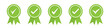 Set of green approved or certified medal icons in a flat design