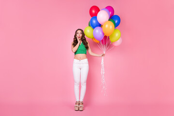 Sticker - Full length photo of astonished girl hold many balloons present gift for festive occasion party wear trousers isolated over pink color background