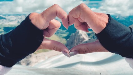 Poster - Woman creating heart sign with her hands on a mountain scenario