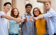 © Prostock-studio - Students Gesturing Thumbs Up Approving University Standing Outdoor