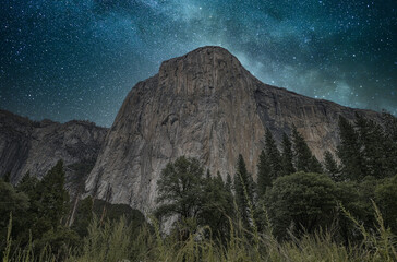 Wall Mural - Panoramic shot of the Yosemite National Park on a stary night background