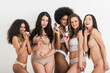 © oneinchpunch - Group of women with different body and ethnicity posing together to show the woman power and strength. Curvy and skinny kind of female body concept