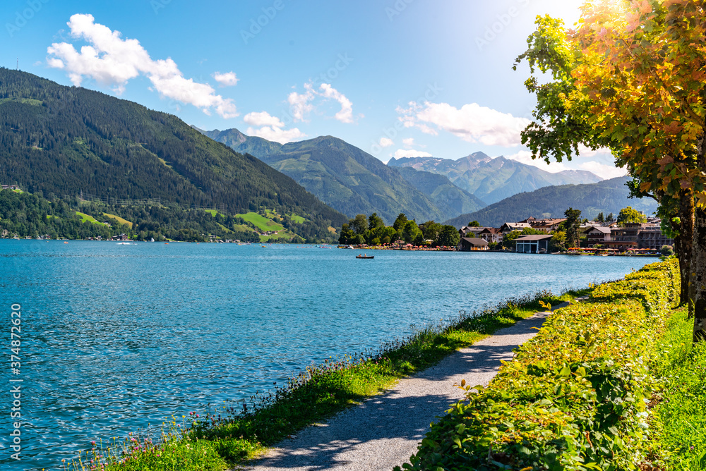 Lake Zell, German: Zeller See, and mountains on the backround. Zell am See, Austrian Alps, Austria - obrazy, fototapety, plakaty 