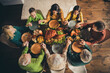 © deagreez - Top above high angle view of nice attractive peaceful thankful family sitting around served table praying god saying grace appreciate domestic meal at modern loft industrial wooden interior house