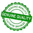 Grunge green genuine quality word round rubber seal stamp on white background