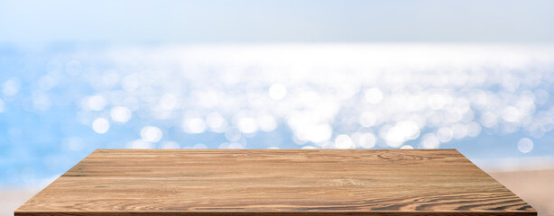 Aufkleber - summer background.Empty perspective wood table with blur sea and sky bokeh background, banner mockup template for display of product
