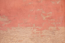 Abstract Pink Background Texture From Weathered Cement And Plaster Wall