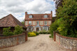 © Seadog81 - The driveway leading to an expensive country home