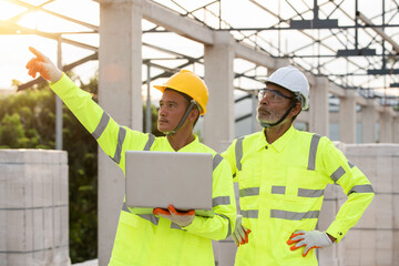 Sticker - Engineering and supervisor working together in the construction site