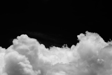 Wall Mural - isolated clouds over black.