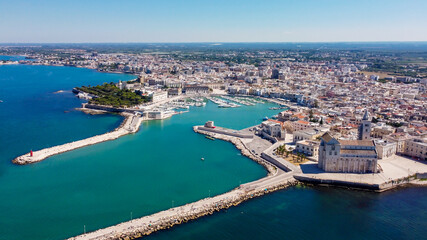 Wall Mural - Aerial view of Trani in the southeastern region of Apulia in Italy - Entrance to the old port of Trani from above with the Cathedral of San Nicola Pellegrino on the coast of the Adriatic Sea