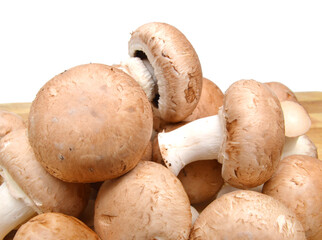 mushrooms vegetables isolated on wooden board