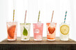 © Rhonda Adkins/Stocksy - Five varieties of lemonade with colored straws