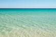 © Gillian Vann/Stocksy - beautiful beach with golden sand and crystal clear aqua blue water