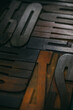 © MyMicrostock/Stocksy - Wood type Letters Background