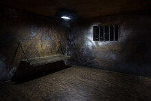 Jail Or Prison Cell. Old Grunge Prison Miniature. Dark Prison Interior Creative Decoration. Empty Cell. Selective Focus Obsolete Gray Grunge Concrete Room.