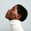 © BONNINSTUDIO/Stocksy - A Black Woman in Profile with Closed Eyes