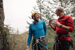 © Rob and Julia Campbell/Stocksy - Two older friends enjoying nature and rock climbing together.