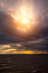 Canvas Print - Seascape and clouds in rain season with sunlight.