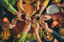 Cropped Top Above High Angle View Of Hands Friends Friendship Family Parents Sitting Around Served Table Clinking Glasses Celebratory Time Evening November Custom Tradition