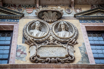 Wall Mural - Bas-reliefs on the walls of ancient buildings in Verona, Veneto, Italy