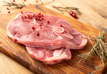 Wall Mural - Raw Lamb Chops, Mutton Cuts or Sheep Ribs on Wood Background