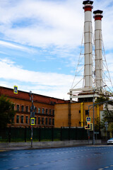 Factory building with two pipes