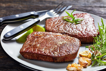 Sticker - fried rump beef steaks on a plate