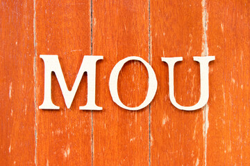 Poster - Alphabet letter in word MOU (Abbreviation of memorandum of understanding) on old red color wood plate background