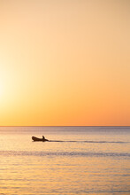 Sunrise With Lone Fisherman