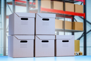 Wall Mural - Cardboard boxes on the background of warehouse racks. Box for paper archives. Professional document storage. Storage of business papers of firms. The concept of storage.