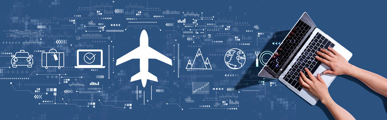 Wall Mural - flight ticket booking concept with woman using a laptop computer