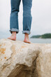 © HEX./Stocksy - Walking Barefoot on Rocks