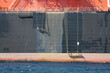 © Ferenc Boros/Stocksy - Paused maintenance paintwork on ship at lunch break