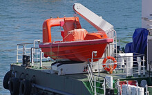 Orange Lifeboat On Ship