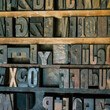 © Margaret Vincent/Stocksy - letter blocks for typesetting