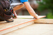 © Sean Locke Photography/Stocksy - Construction: Framer Making Measurement Mark with Pencil