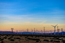 Silhouette Of Windmills At Dusk In Palm Springs, California, USA.