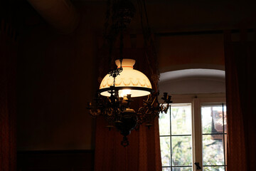 Sticker - Chandelier with a lamp in the room