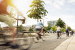 Leinwandbild Motiv A group of moving cyclists in the city