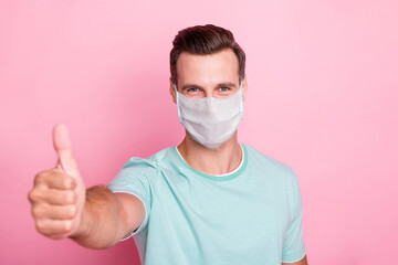 Sticker - Close-up portrait of his he nice attractive content brown-haired guy showing thumbup wearing safety cotton mask stop pandemia influenza health care insurance isolated over pink color background