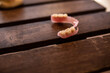 © Dani - Flexible denture on a wooden table