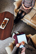 © Przemek Klos - Professional psychologist doctor giving the consult to female patient. Close shot from above of two women during psychotherapy session. Therapist writing down notes during meeting with her patient
