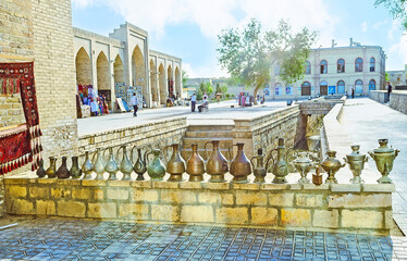 Sticker - The old metal pitchers in market in Bukhara, Uzbekistan