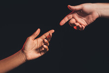 Racial Friendship. Help Support. Closeup African Caucasian Male Hands Reaching Out Each Other Isolated On Dark Copy Space. Ethnic Tolerance. No Racism. Black Lives Matter