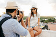 © kleberpicui - Happy tourist couple taking pictures. Travel and love concept in Latin America