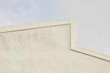 Fototapete - Abstract urban architecture. Close up of a contemporary building rooftop.