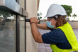 © Kiko Photos - WOMAN WORKING ON THE REFORM OF AN OLD HOTEL AT TENERIFE ISLAND